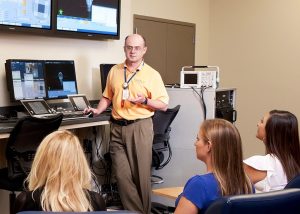 image: Instructor trains radiation therapists on TrueBeam technology at Varian in Palo Alto, California (Credit: image supplied Varian Medial Systems) 